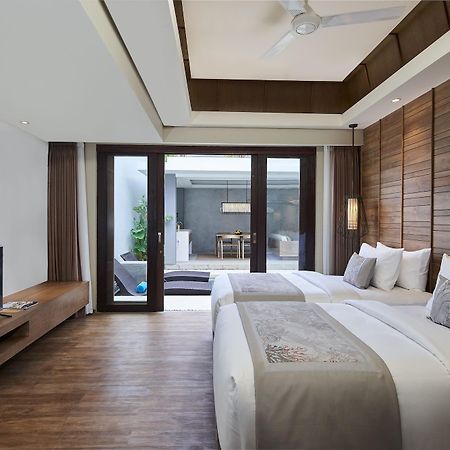 Hotel Cross Bali Breakers à Jimbaran Extérieur photo